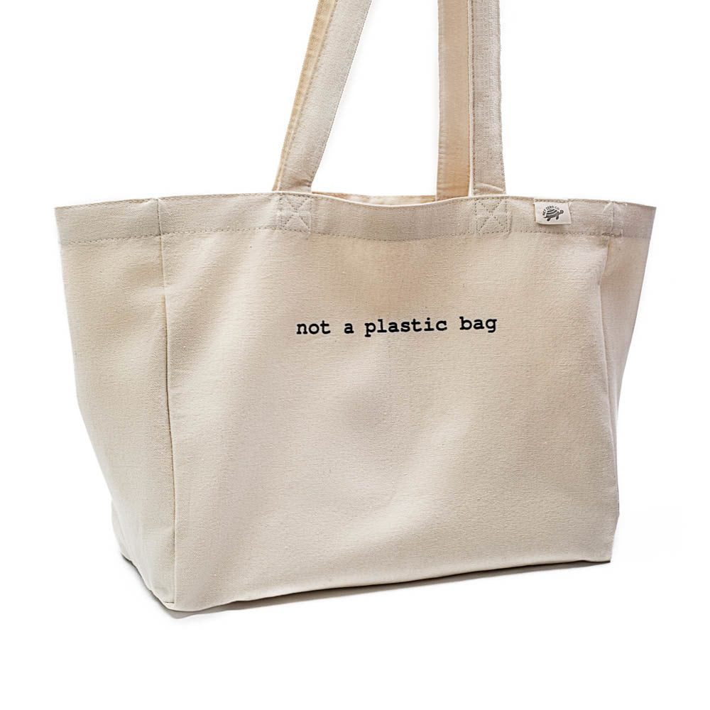 https://www.netzerocompany.com/cdn/shop/products/eco-tote-bag-made-of-organic-cotton-not-a-plastic-bag-1000x1000_349522b4-e8f3-41f1-a736-b39dfcc4e9ae.jpg?v=1643966428